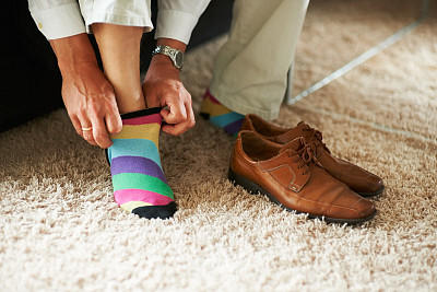 What is the emphasis on the matching of men's pants, socks and shoes?
